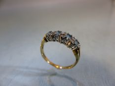 9ct GOLD half Eternity ring set with blue Topaz stones. Size M.5
