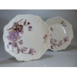 Two Antique Limoges plates c 1900. Decorated with printed flowers.