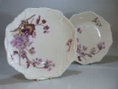 Two Antique Limoges plates c 1900. Decorated with printed flowers.