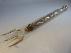 Silver handled toasting fork - the large silver handle with banded decoration and floral swags.