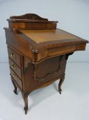 Edwardian mahogany davenport on tapering legs with inlay front