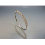 Silver bangle with double row of CZ