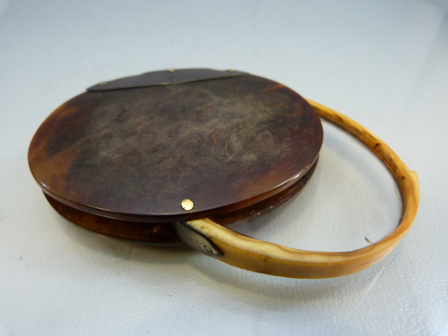 Early 19th Century Tortoise shell and bone bound magnifying glass with small chip to glass