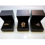 Three boxed sterling silver rings