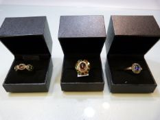 Three boxed sterling silver rings