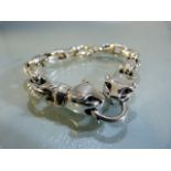 Silver linked bracelet with panther clasps