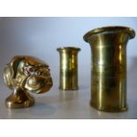 Trench art snuff box in the form of a dogs head along with two trench art candle holders