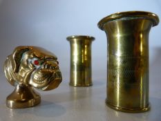 Trench art snuff box in the form of a dogs head along with two trench art candle holders