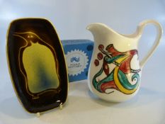 Poole Pottery Aegean plate with penguin design along with an unusual hand painted Royal Doulton jug