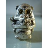Unusual silver plated vesta case in the form of a monkey with glass eyes