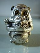 Unusual silver plated vesta case in the form of a monkey with glass eyes