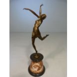 Art Deco Style Bronze of a prancing lady with outstretched arms and leg, stamped `BRONZE GARANTO