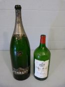 Vintage large champagne bottle and one other bottle