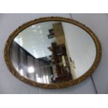 Gilt and Gesso oval mirror
