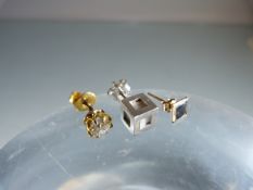 3 x Single Earrings: (1) ½ carat clean Brilliant cut Diamond. (2) Silver (925) approx: 6.4 cube. (3)