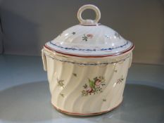 Staffordshire Tea caddy of oval form in Pratt colours. Loop handle to lid with fixed loop handles to