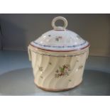 Staffordshire Tea caddy of oval form in Pratt colours. Loop handle to lid with fixed loop handles to