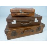 Three antique leather cases