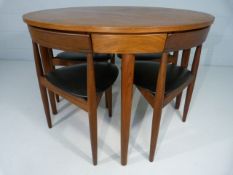 Hans Olsen for Frem Rojle - Danish Mid-Century extending round dining table and 4 black mid