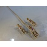 9ct Gold Rennie MacIntosh style Pendant and earrings set. Hung on a 16” curb link chain is an
