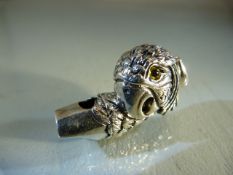 Silver whistle in the form of a parrot