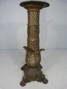 Unusual cast metal plant stand / Torchere with scale type set top leading to a panel of men and a