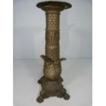 Unusual cast metal plant stand / Torchere with scale type set top leading to a panel of men and a