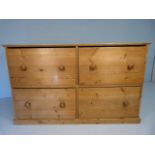 Large antique pine chest of four deep drawers
