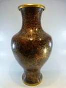 Oriental Cloisonne vase of large form with trumped neck. Dark colours throughout.