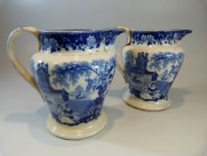Pearlware - a pair of Antique c. 1825 transfer blue and white pouring jugs - printed with