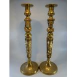 Pair of unusual Brass Totem style candlesticks of large form of ecclesiastic nature- approx 45 cm