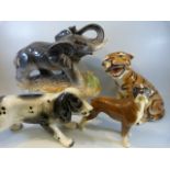 Four large animal figures to include a Tiger, Spaniel, Elephant and a Beswick boxer