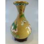 Cloisonne - a Good beige ground bulbous vase with trumpet neck decorated with flora and