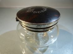 Dressing table pot with Tortoiseshell and hallmarked silver lid. Inlaid with cartouche.