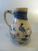 18th Century Dutch delft jug decorated in underglaze blue scenes of Pagoda's and a Liver type