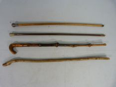 Hallmarked silver topped cane along with three others