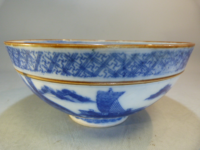 A Chinese bowl decorated in Blue and White with flowers and a two men in a sailing boat with a - Image 13 of 13