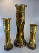 Trench Art - Three similar shell cases converted to vases with pinched middles - all mounted on