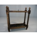 Carved oak umbrella / Stick stand with original trays.