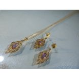 9ct Gold Pendant and earrings set. Hung on an 18” flat curb link chain is an approx: 28.6mm