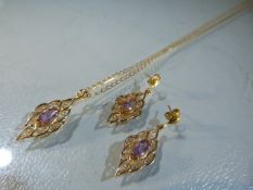 9ct Gold Pendant and earrings set. Hung on an 18” flat curb link chain is an approx: 28.6mm