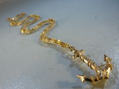 9ct Gold chain approx 75cm long with a 9ct Anchor pendant with rope twists (total weight approx 9.