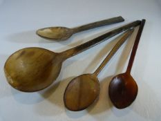 Four Early (Inuit) carved horn spoons of simplistic form