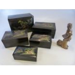 Set of 5 lacquered oriental boxes and a cold stone figure of an oriental lady with her catch.