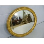Gilt framed antique oval wall mirror