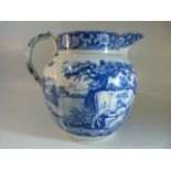 Early 19th Century pearlware blue and white transfer printed staffordshire jug of large form