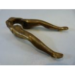 Brass Mid century nut cracker in the form of a pair of ladies legs