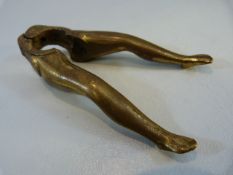 Brass Mid century nut cracker in the form of a pair of ladies legs