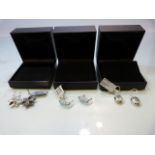 Three boxed sets of silver earrings to include Shell set earrings, Swiss Blue Topaz and Blue Topaz