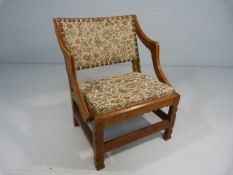 Oak studded and upholstered bedroom chair